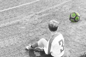 Joanna's son playing football