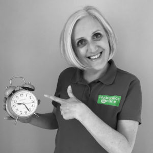 Joanna Hydraulics Online pointing at a clock
