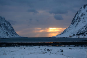 Arctic Sunset between two icebergs