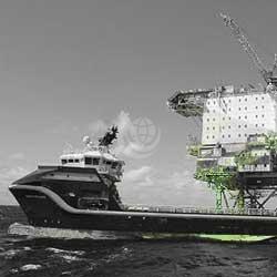 Vessel docked up by oil rig