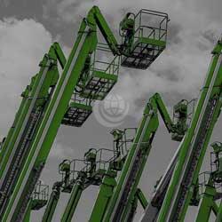 green telescopic booms with cloudy sky background