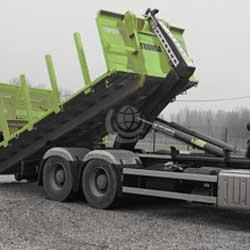 Hooklift truck tipping its load