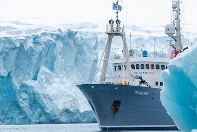 Polarfront arctic exploring vessel Traversing ice bergs.